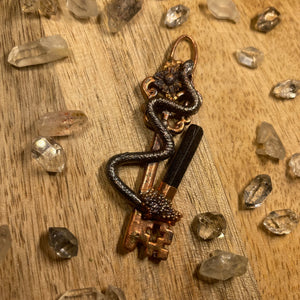 Snake Inner Beast Key with Tourmaline  and a real Starflower